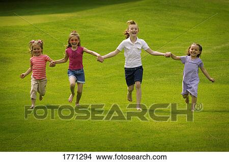 Four girls playing View Large Photo Image Picture - Four girls playing. Fotosearch