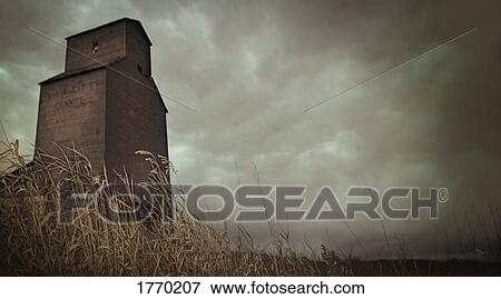 Grain Elevator and dark sky View Large Photo Image Stock Photo - Grain Elevator and dark sky. Fotosearch