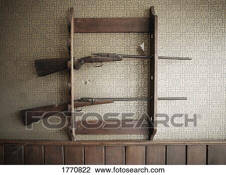 Gun rack with guns View Large Photo Image Stock Image - Gun rack with guns. Fotosearch