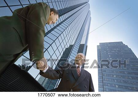 Banco de Imagem - homens negócio. Fotosearch