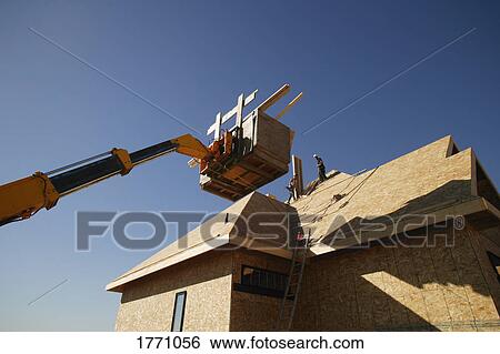 Stock Photograph - House construction. Fotosearch