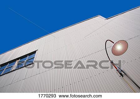 Industrial building with outside light View Large Photo Image Stock Image - Industrial building with outside light. Fotosearch