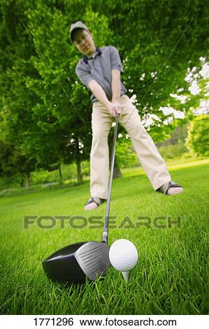 Stock Photograph - Male golfer. Fotosearch