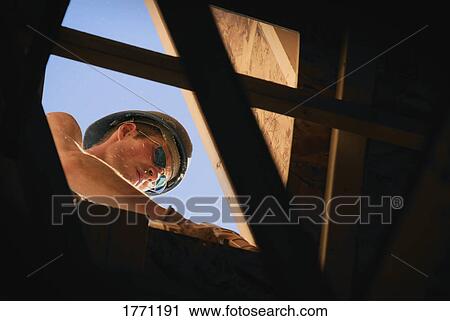 Man building View Large Photo Image Stock Image - Man building. Fotosearch