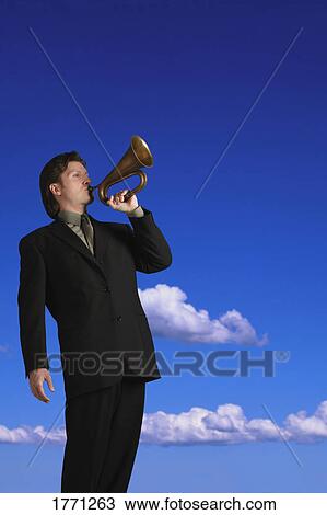 Man in suit blowing a bugle View Large Photo Image Stock Image - Man in suit blowing a bugle. Fotosearch