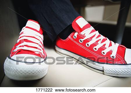 Pair of red sneakers View Large Photo Image Stock Image - Pair of red sneakers. Fotosearch