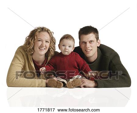 Parents with small child View Large Photo Image Stock Photo - Parents with small child. Fotosearch