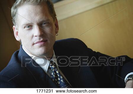 Stock Image - Proud and Confident Caucasian businessman. Fotosearch