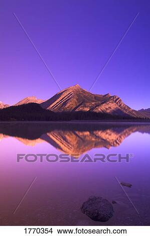 Reflections on Upper Kananaskis Lake, Kananaskis Country Alberta, Canada View Large Photo Image Picture - Reflections on Upper Kananaskis Lake, Kananaskis Country Alberta, Canada. Fotosearch