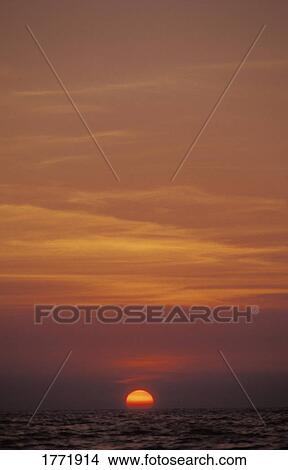 Sea at sunset View Large Photo Image Picture - Sea at sunset. Fotosearch