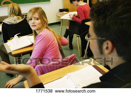 Stock Photo - Student questioning another student. Fotosearch