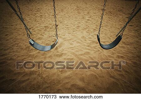 Stock Image - Swings in a park. Fotosearch