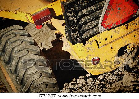 Tractor tires in mud View Large Photo Image Stock Photo - Tractor tires in mud. Fotosearch