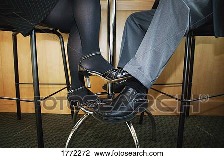 view of a man and woman's feet View Large Photo Image Stock Image - view of a man and woman's feet. Fotosearch