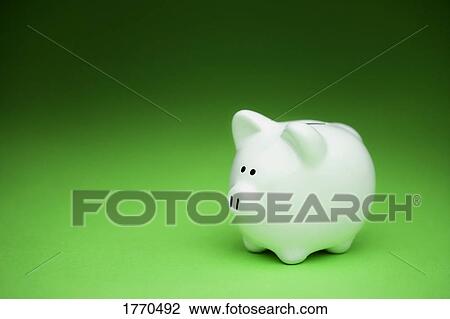 Stock Image - White pottery piggy bank. Fotosearch