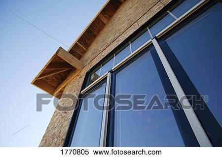 Stock Photography - Window and gable of new house. Fotosearch