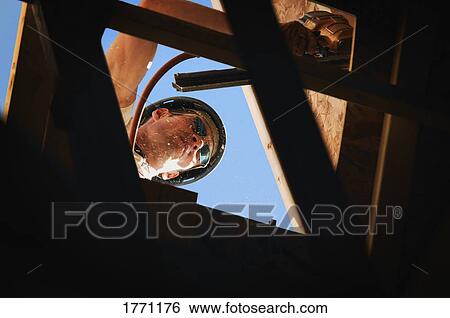 Workman building View Large Photo Image Stock Photograph - Workman building. Fotosearch
