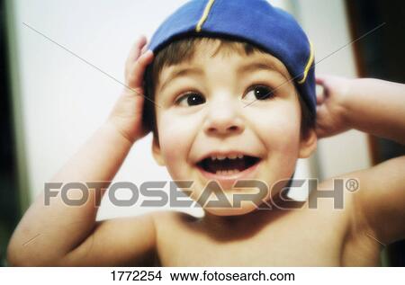 Young child with hat View Large Photo Image Picture - Young child with hat. Fotosearch
