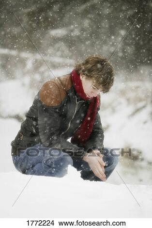 Young man waiting in snow View Large Photo Image Picture - Young man waiting in snow. Fotosearch