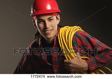 Picture - Aboriginal construction worker. Fotosearch