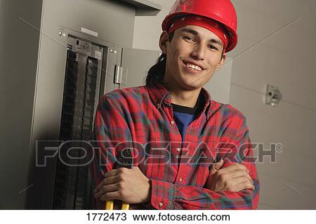 Stock Image - Aboriginal Electrician. Fotosearch