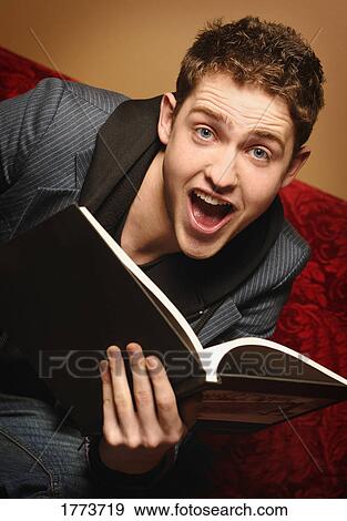Stock Photo - Astonished looking teen. Fotosearch