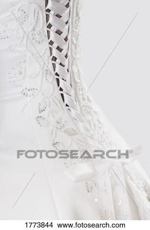 Back detail of wedding dress View Large Photo Image Picture - Back detail of wedding dress. Fotosearch