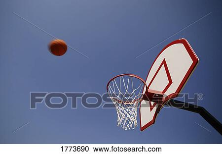 Stock Image - Basketball and hoop. Fotosearch