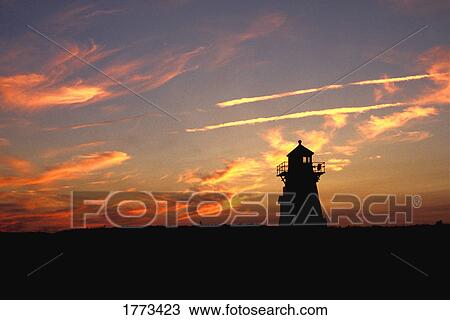 Beautiful sunset and silhouetted building View Large Photo Image Stock Image - Beautiful sunset and silhouetted building. Fotosearch