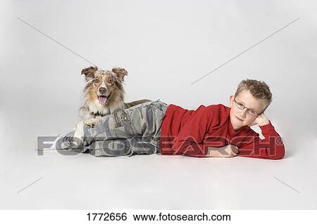 Stock Photograph - Boy and his dog. Fotosearch