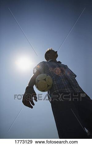 Boy with soccer ball View Large Photo Image Stock Photo - Boy with soccer ball. Fotosearch