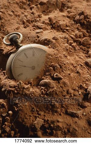 Buried pocket watch View Large Photo Image Stock Image - Buried pocket watch. Fotosearch