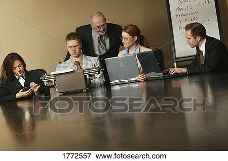 Stock Photo - Business meeting. Fotosearch