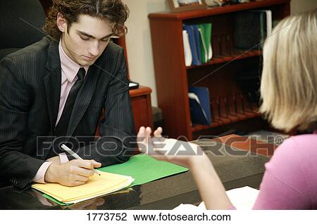 Businessman in meeting View Large Photo Image Stock Image - Businessman in meeting. Fotosearch