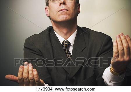 Picture - Businessman surrendering. Fotosearch