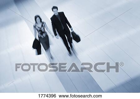 Stock Photograph - Businesspeople walking. Fotosearch
