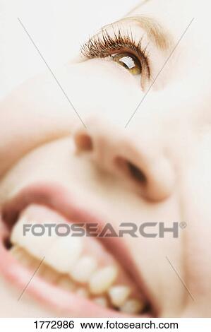 Close up of partial woman's face View Large Photo Image Stock Photograph - Close up of partial woman's face. Fotosearch