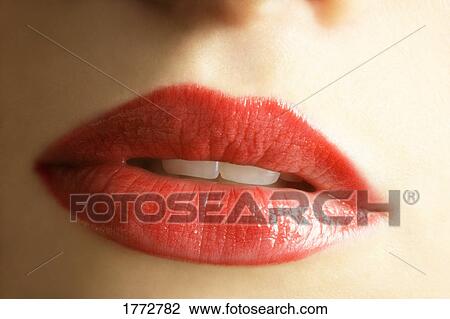 Stock Image - Close up of woman's mouth. Fotosearch