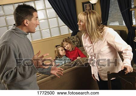 couple fighting in front of two children View Large Photo Image Stock Image - couple fighting in front of two children. Fotosearch