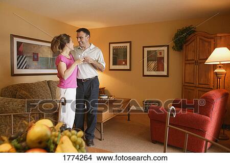 Couple having drink View Large Photo Image Picture - Couple having drink. Fotosearch