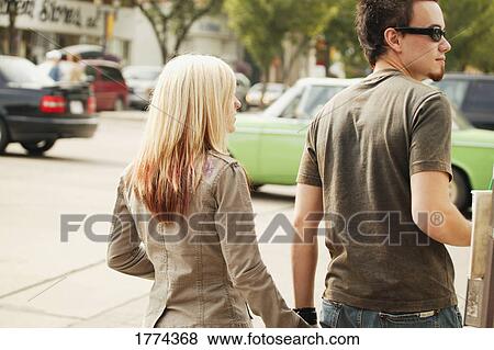 Couple walking View Large Photo Image Stock Photo - Couple walking. Fotosearch
