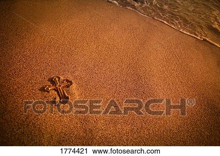 Cross lying in the sand View Large Photo Image Stock Image - Cross lying in the sand. Fotosearch