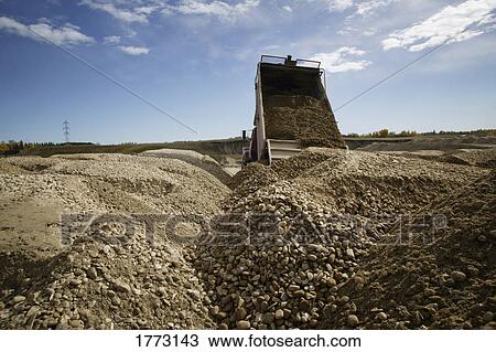 Delivering load of rocks View Large Photo Image Stock Image - Delivering load of rocks. Fotosearch