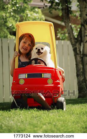 Dog and girl on a road trip View Large Photo Image Picture - Dog and girl on a road trip. Fotosearch