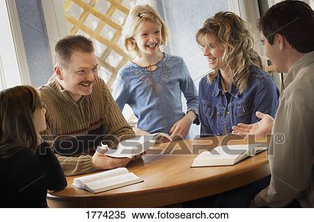 Stock Photography - Family devotions. Fotosearch
