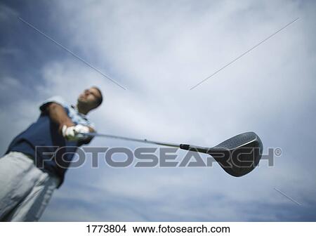 Golf club and golfer View Large Photo Image Picture - Golf club and golfer. Fotosearch