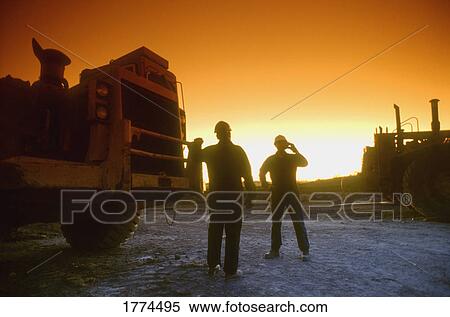 Industrial worker on the phone View Large Photo Image Stock Photography - Industrial worker on the phone. Fotosearch