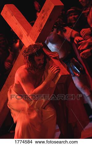Picture - Jesus carrying cross. Fotosearch