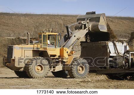 Machines hard at work View Large Photo Image Stock Image - Machines hard at work. Fotosearch
