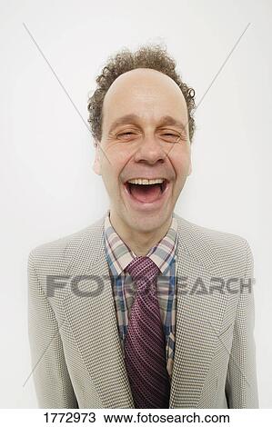 Stock Image - Man laughing. Fotosearch